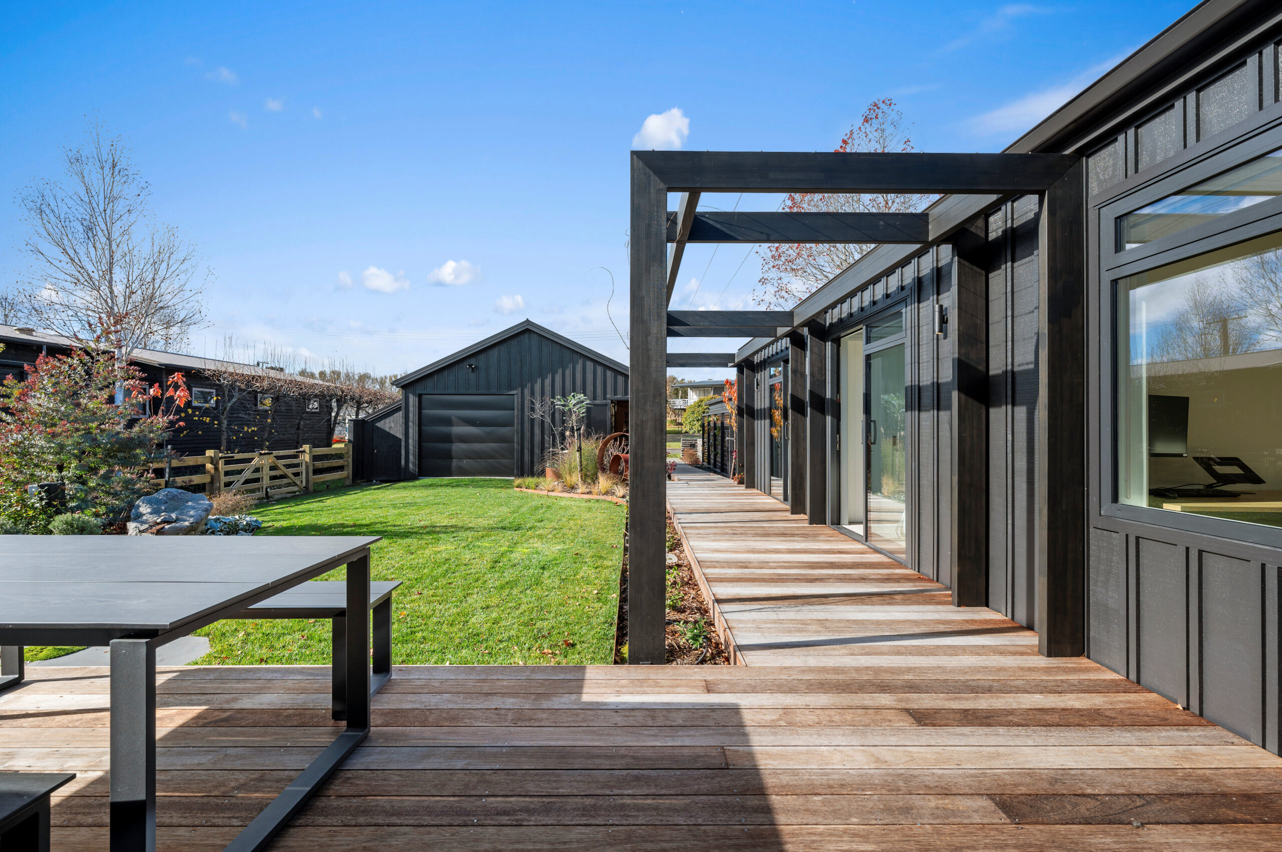 Landscaping inspiration with this broad-walk, breezeway and garden by your local qualified builders Taupo.