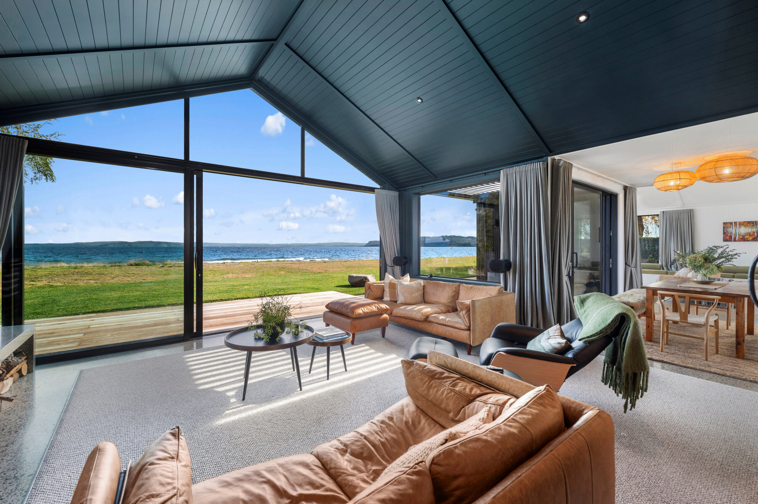 The Lake Taupo views complement the architecture of this bespoke home.