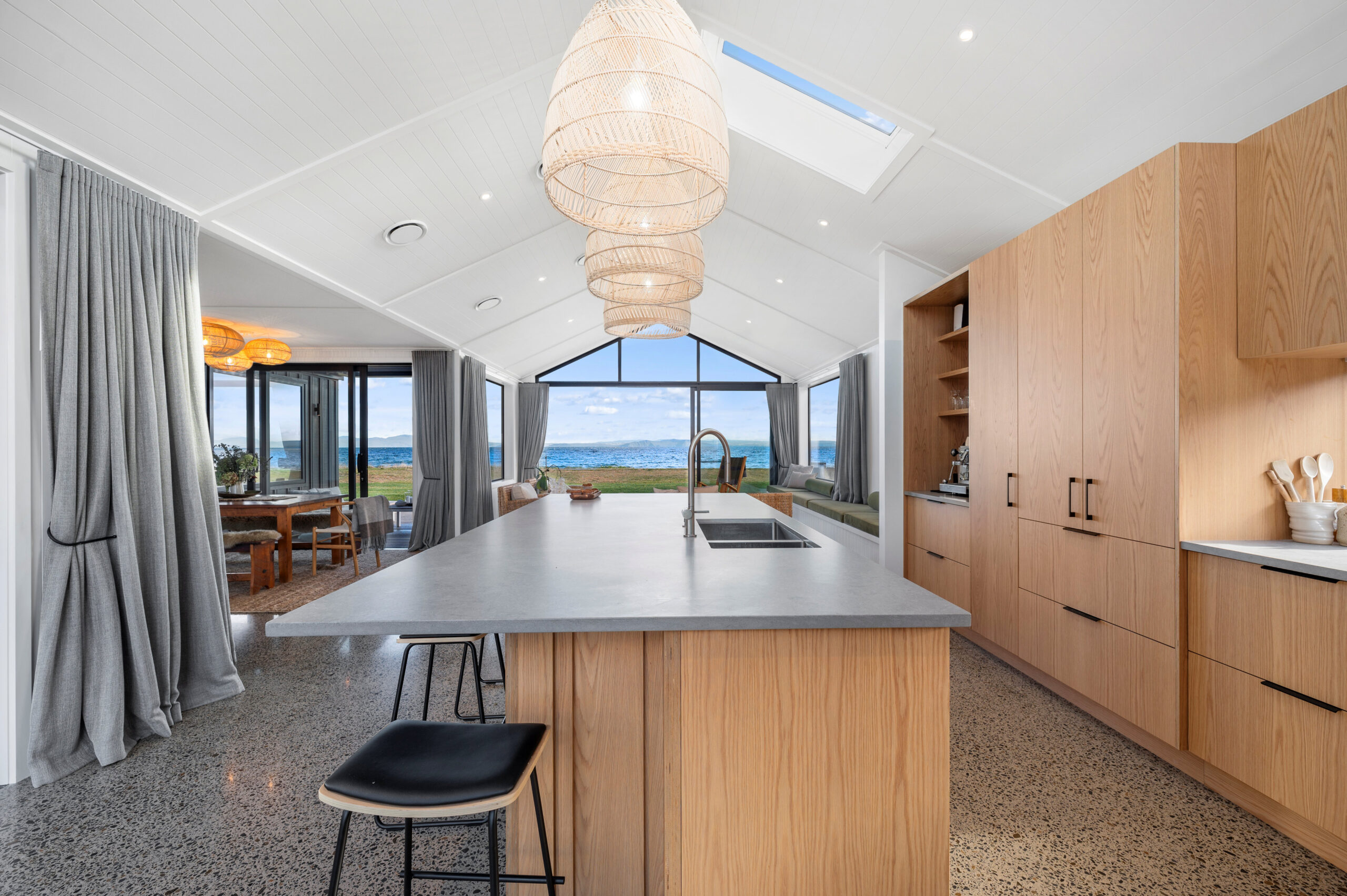 This Kitchen Island is central to the entertainment space and expertly executed by Built Spaces. The large windows, skylights and pitched ceiling are capturing all the Natural light in this new home in Taupo.